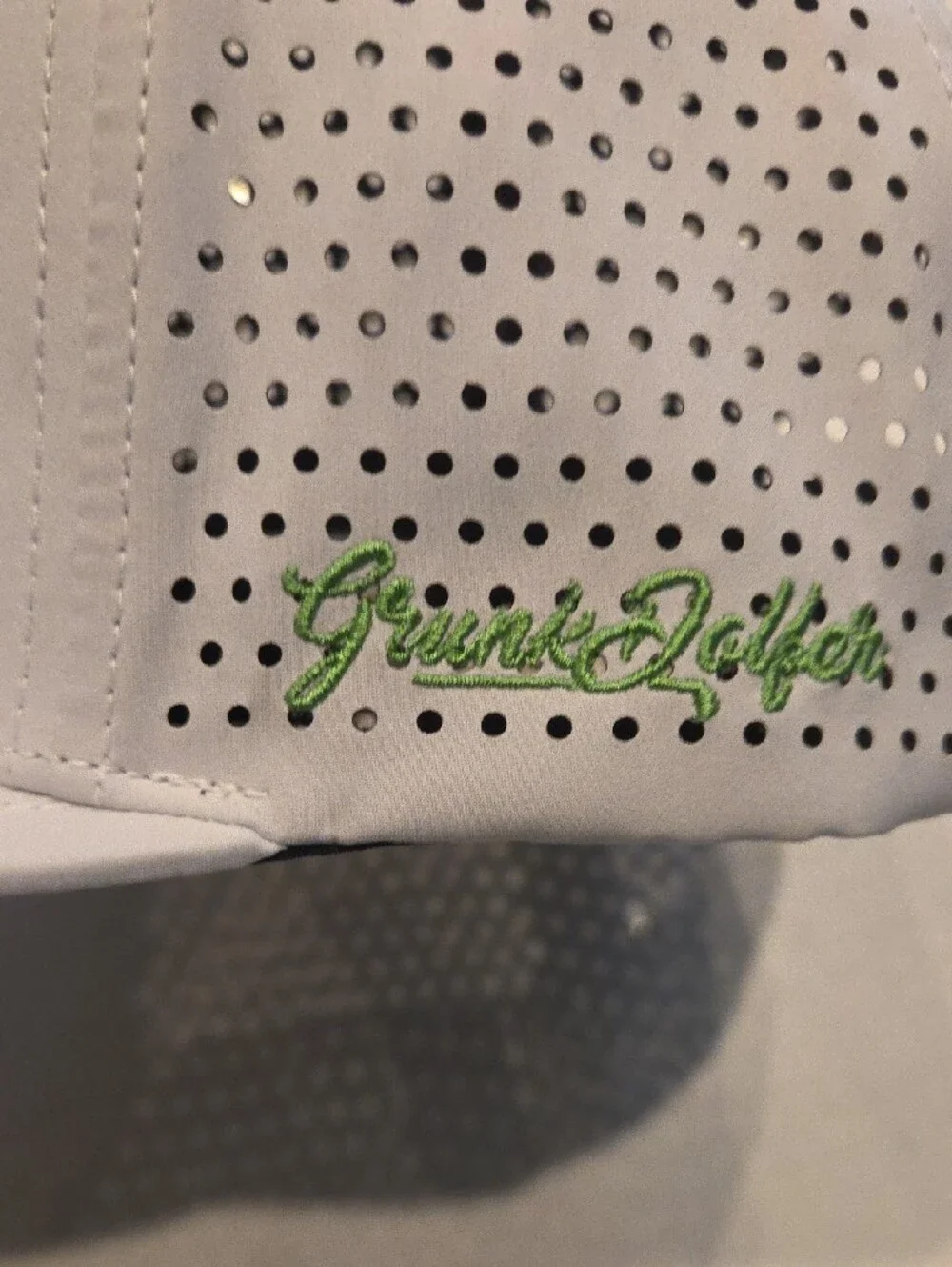 Grunk Dolfer Golf Cap with Green Script  Embroidery